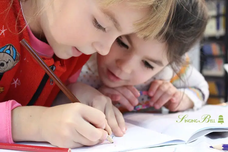 Children-studying-and-drawing : Singing Bell Music enhances Reading and Comprehension