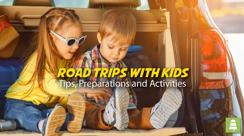 Kids sitting in an open trunk of a car, ready for a road trip. : Singing Bell