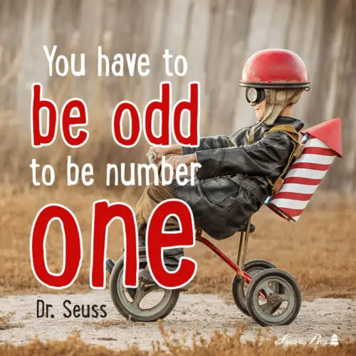 Dr. Seuss Quote for kids on image of boy on a bike.